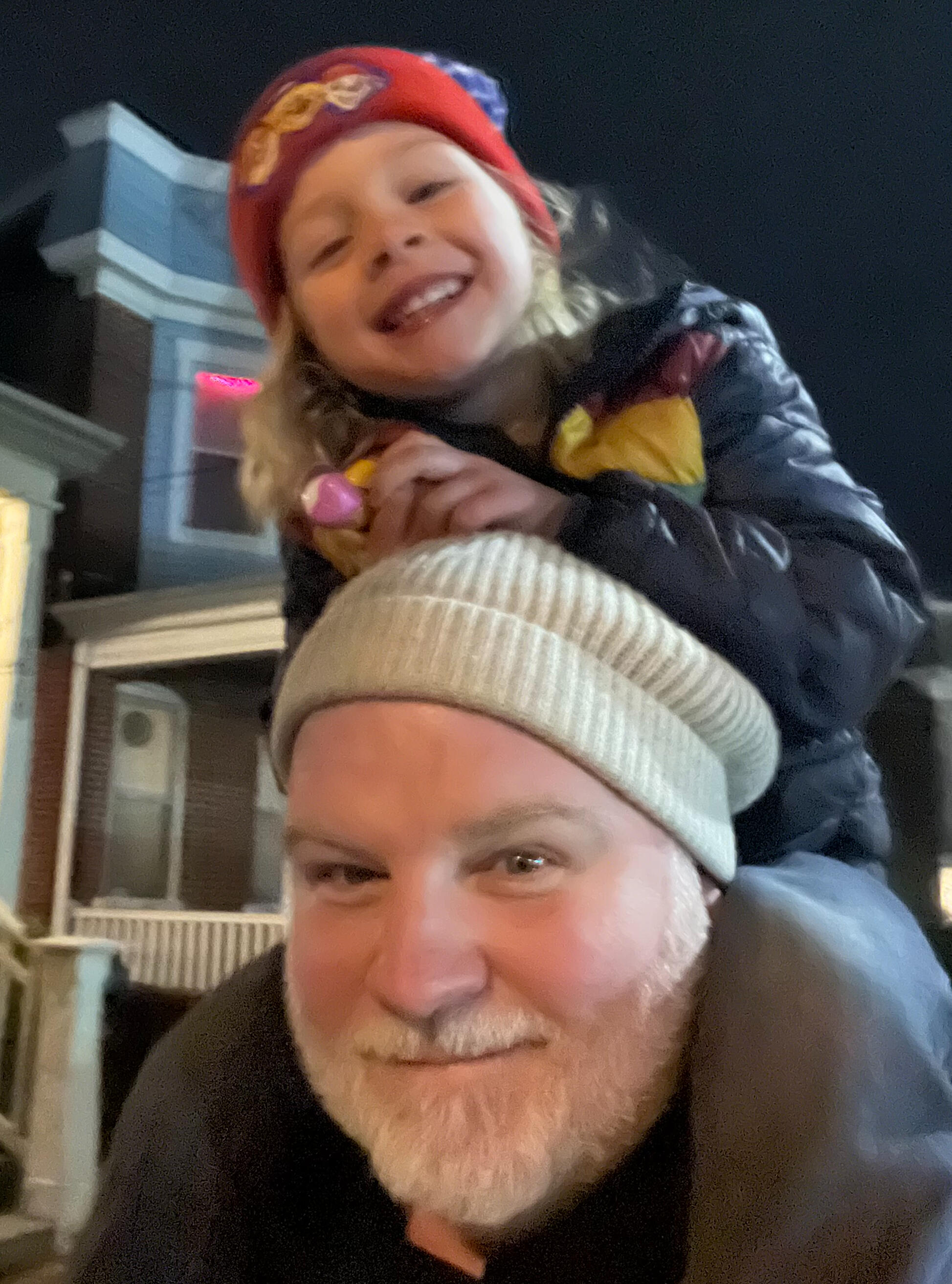 Emmy and Dad walking back from dinner with her on my shoulders.